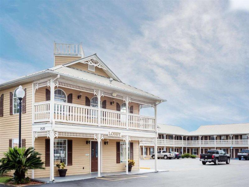 Motel Super 8 By Wyndham Foley Extérieur photo